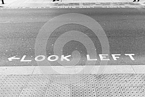 Look left sign on the ground in London