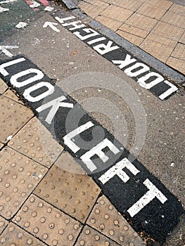 Look left, written on the street in London