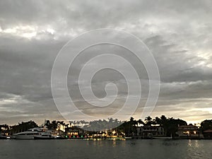 A look over the bay at yachts and mansions in Miami Beach, Florida