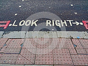 `Look right` inscription on the street. London.