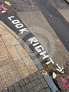 Look right, written on the street in London UK