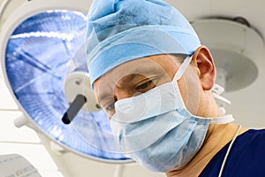 Look of surgeon with lamp