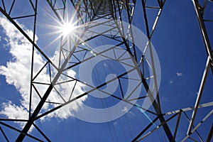 Look up and see the beautiful sunshine through the electric tower