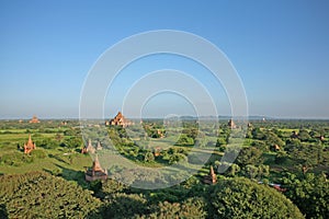 The red brick stupas and pagodas of the Bagan plains stretch out to the horizon