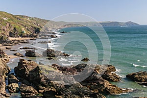 Looking across the beach at Whitesand Bay in Cornwall towards th