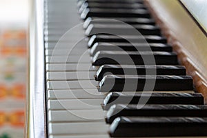 Looking along a piano keyboard, with selective focus