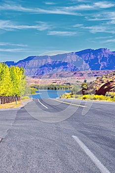 Looking back towards Moab Panorama views of desert mountain ranges along Highway 191 in Utah in fall. Scenic nature near Canyonlan