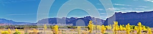 Looking back towards Moab Panorama views of desert mountain ranges along Highway 191 in Utah in fall. Scenic nature near Canyonlan