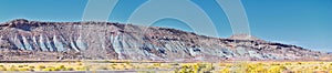 Looking back towards Moab Panorama views of desert mountain ranges along Highway 191 in Utah in fall. Scenic nature near Canyonlan