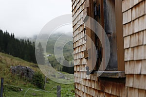 Looking through broken old window wooden