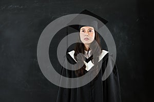 Looking daze female student in black photo
