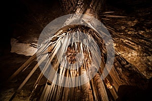 Looking directly up at Stalactite in cave