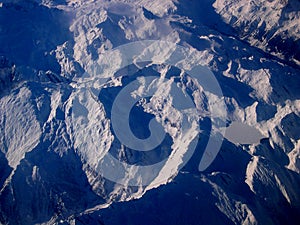 Looking down on the Alps flying from Rome to the UK