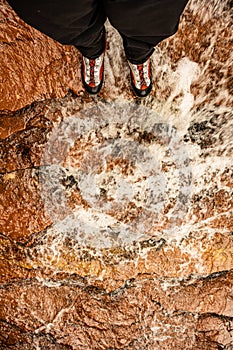 Looking Down At Canyoneering Boots In Rushing Creek