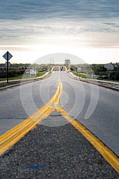 Looking down center of street towards bridge