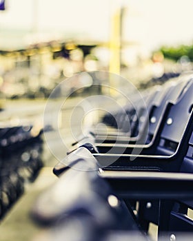 Looking Down the Line of a Row of Blue Stadium Seats