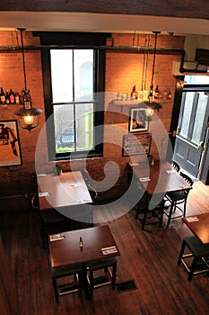 Looking down on neatly set tables on hardwood floors, Harvey's Restaurant and Bar,Saratoga,2015