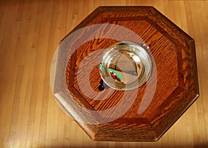 Looking down into old wooden font ready for Christian baptism