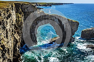 Looking down onto the Green Bridge of Wales on the Pembrokeshire coast, Wales