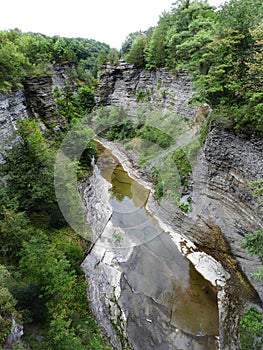 Looking down scenic deep gorge from railroad bridge