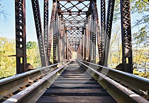 Looking down thetracks on a train bridge