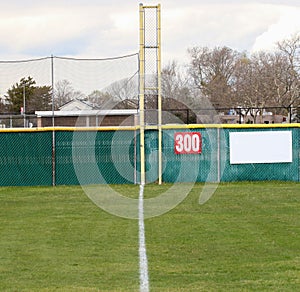 Looking down the third base foul line to the foul pole of a baseball field