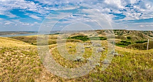 Looking down a valley of grasslands at Diefenbaker Lake in Saskatchewan Landing Provincial Park