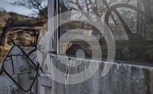 Looking through Dusty Windshield of Old Truck