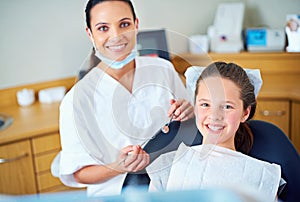 Looking forward to another perfect checkup. Portrait of a young girl have a checkup at the dentist.