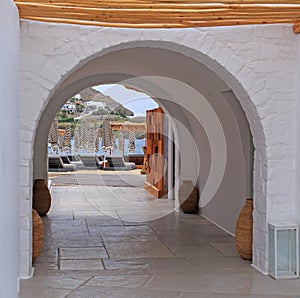 Looking through a Mediterranean white washed arch