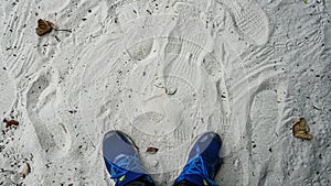 Looking at my feet on the beach