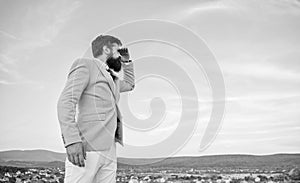 Looking for opportunities and new chances. Developing business direction. Businessman bearded face sky background. Man