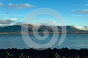 Looking out from Reykjavik Harbour at the Rocky Mountains of Iceland