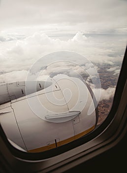 Looking out the window of an airplane