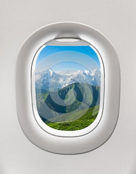 Looking out the window of a plane to the mountains in Georgia