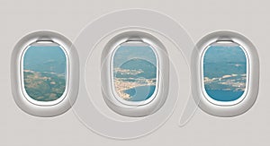 Looking out the windows of a plane to the sea bay