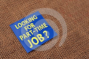 Looking for part time job, text words typography written on paper against wooden background, life and business motivational