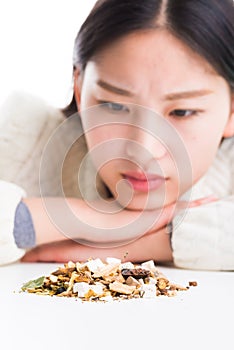 Looking at a pile of Chinese herbs.