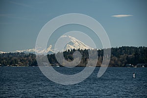 Looking at Ranier mountain across Washington lake from Medina Beach