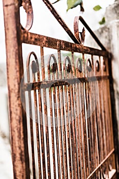 looking sideways at a metal gate