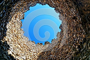 Looking at the sky through hole in tower. Sighnaghi city wall Georgia