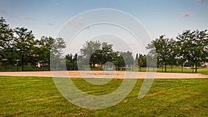 looking in towards home plate of this baseball field from centerfield