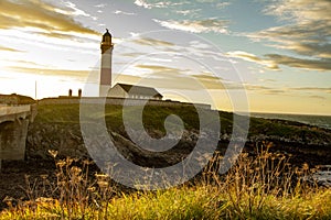 Looking towards the island at the lighthouse Buchan ness,Boddan,Aberdeenshire, Scotland,UK.