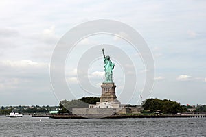 Looking towards The Statue of Liberty, from a water taxi, on Liberty Island in New York Harbor