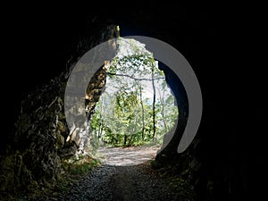 Looking through a tunnel in the Swiss mountains. Alpe Rohr, St. Gallen, Switzerland.