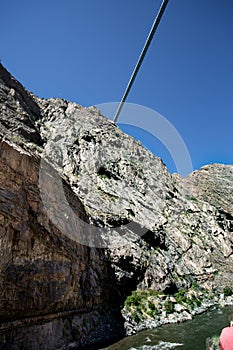 Looking up from 956 feet below the landmark Royal Gorge Suspension bridge