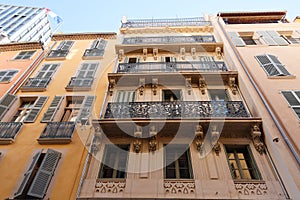 Looking up at the architectural details of an old apartment building in Toulon, France