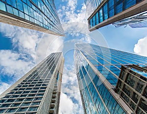 Looking Up Blue Modern Office Building