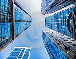 Looking Up Blue Modern Office Building