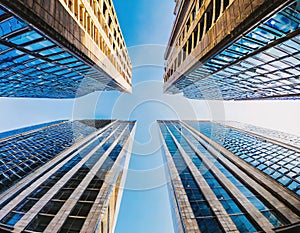 Looking Up Blue Modern Office Building